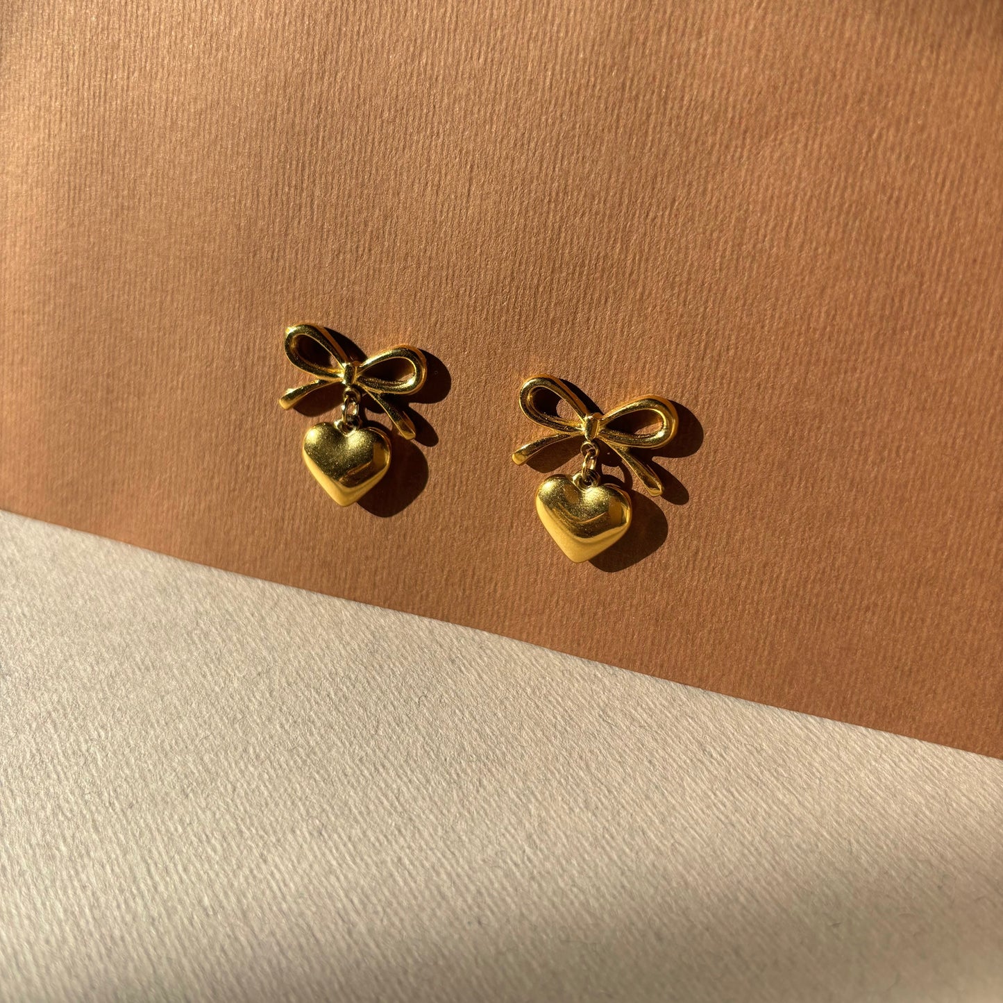 Heart-bow studs